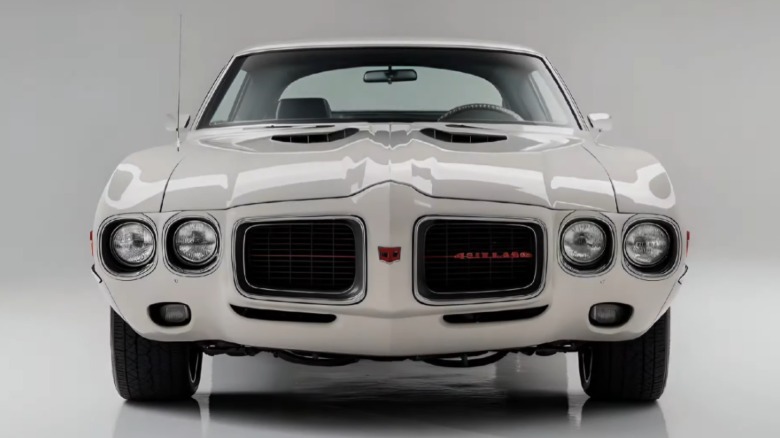 A reimagined white Oldsmobile 442 displayed against a white background.