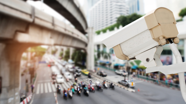 Traffic camera pointing down at busy street