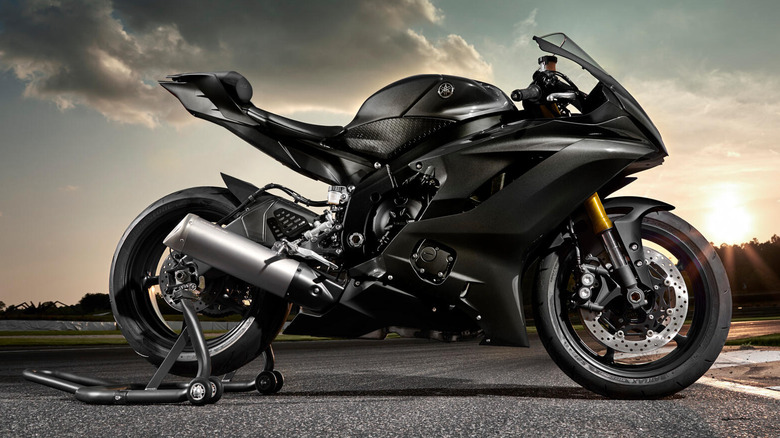 Side view of the 2024 Yamaha YZF-R6 parked on track