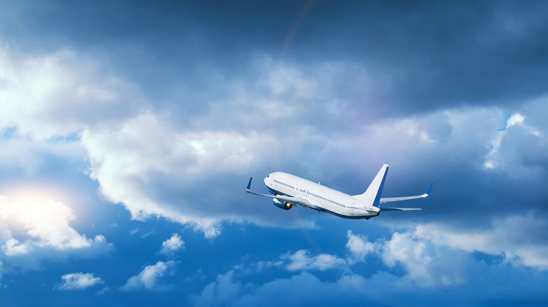 Plane flying in clouds