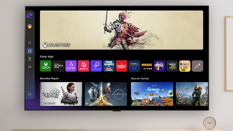 A large flatscreen LG TV hung on a wall in a cozy living room with some apps on display