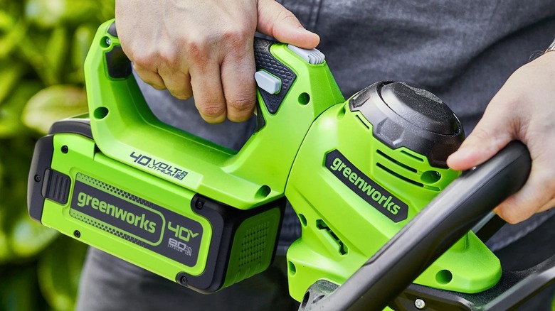 Close-up of a Greenworks tool in use