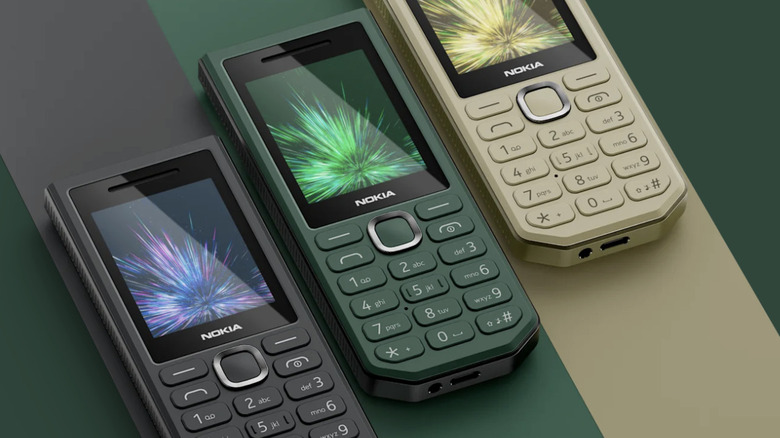 The Nokia 300 Charge phone shown in black, green, and tan