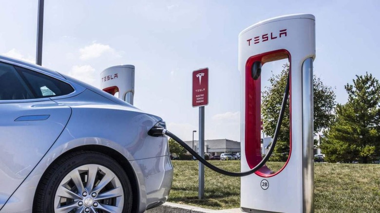 Tesla Supercharger and car