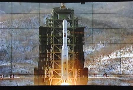 A screen shows a rocket being launched from a launch pad at the West Sea Satellite Launch Site, at North Korea's satellite control centre in Cholsan county, North Pyongan province