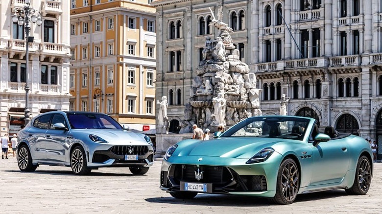 Maserati convertible and SUV models parked in a courtyard