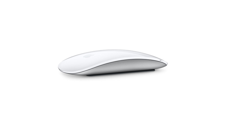 A close up shot of a white Apple Magic Mouse