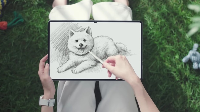 Drawing with an S Pen on a Samsung tablet.
