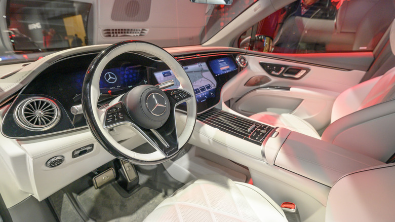 Mercedes-Benz EQS SUV interior with both a driver and passenger touchscreen
