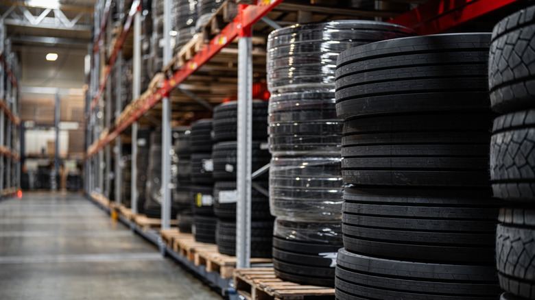 A view of new car and truck tires being stored in warehouse before shipping.