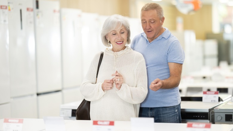Couple shopping for appliances
