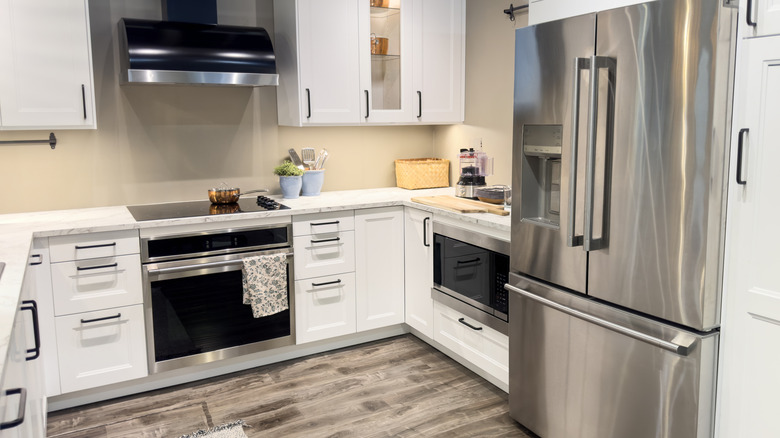 Itchen with different kinds  of home appliances