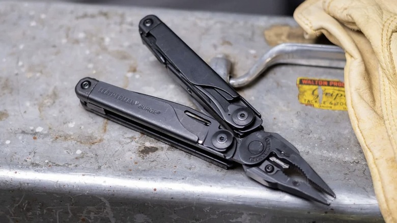 Black Leatherman Surge on a metal toolbox