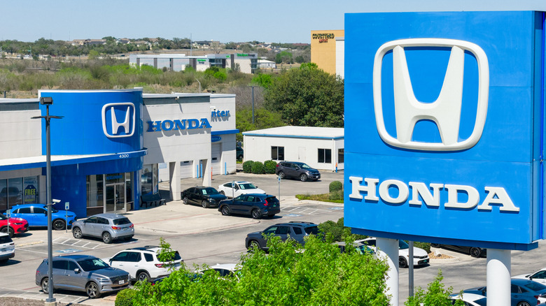 An aerial view of a Honda dealership on a bright sunny day.