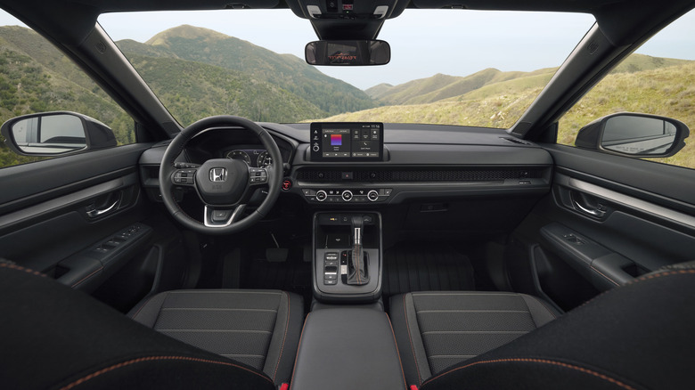 Interior of Honda CR-V with desert hillscape in background