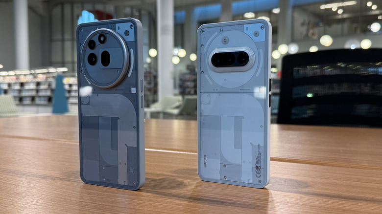 Nothing Phone (3a) Pro and (3a) on a table