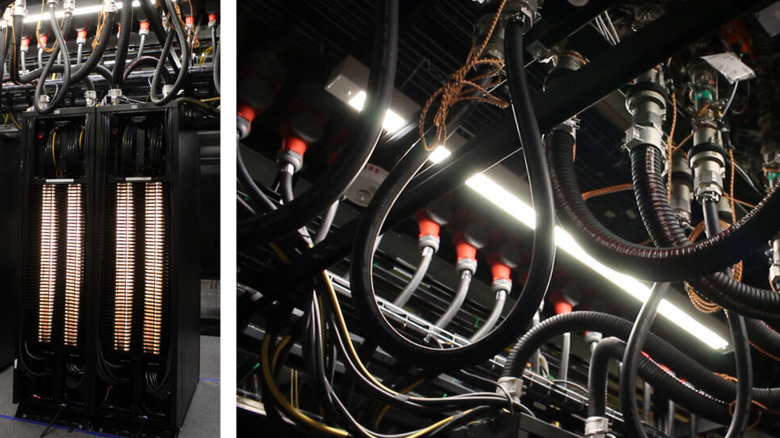 Nvidia's liquid cooling system, showing pipes and hoses delivering coolant to server racks in a data center