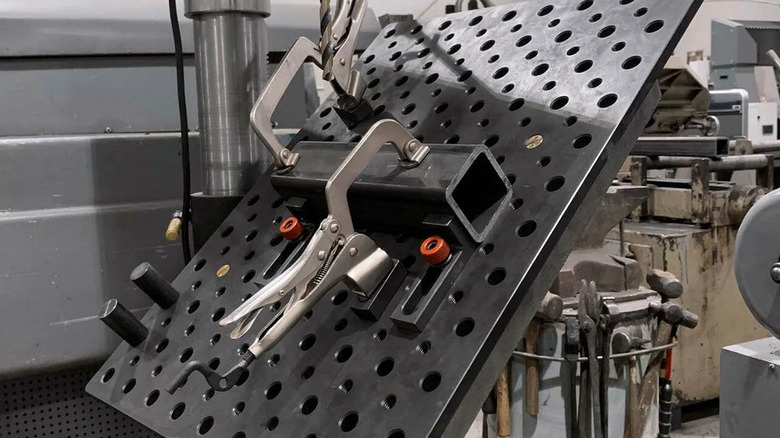Fireball Tool Drill Press Fixture Plate displayed at an angle.