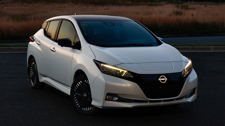 A white 2025 Nissan Leaf parked