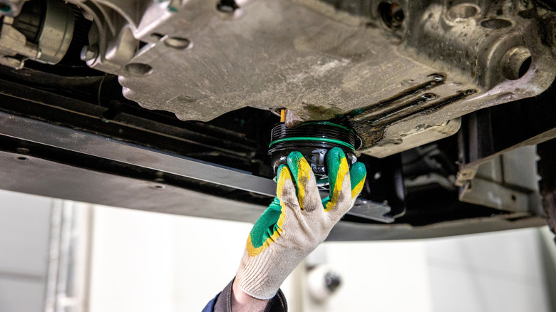 Removing oil filter from car engine