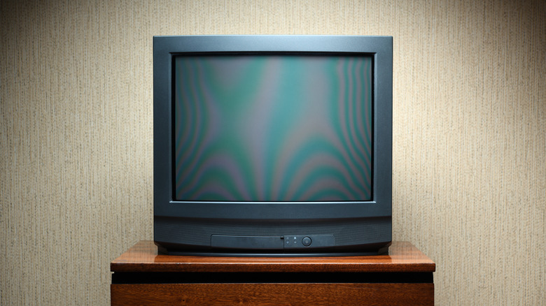 CRT TV on stand