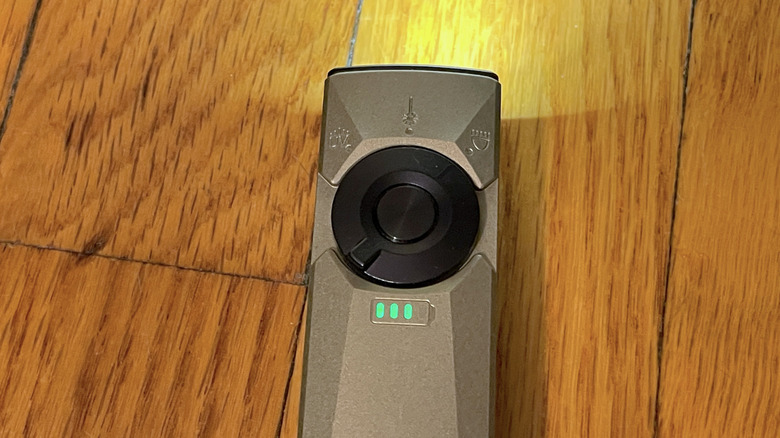 Top of the Arkfeld Ultra with the flashlight on, showing the battery power level lights.