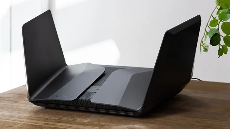 Nighthawk Tri-Band AX12 12-Stream WiFi Router on table