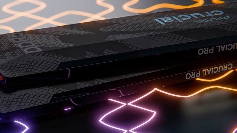 Two sticks of Crucial RAM on a neon background