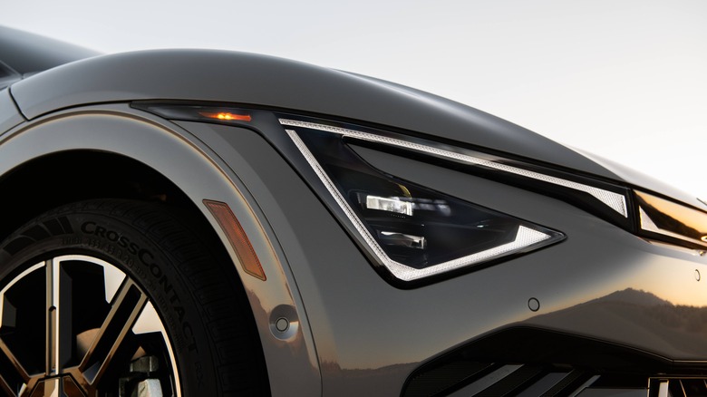 Closeup of the front of a gray Kia EV6