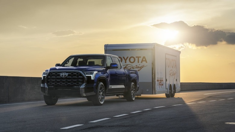 2026 Toyota Tundra Platinum towing a small trailer.