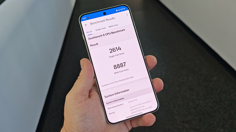 Man holding the OnePlus 15R