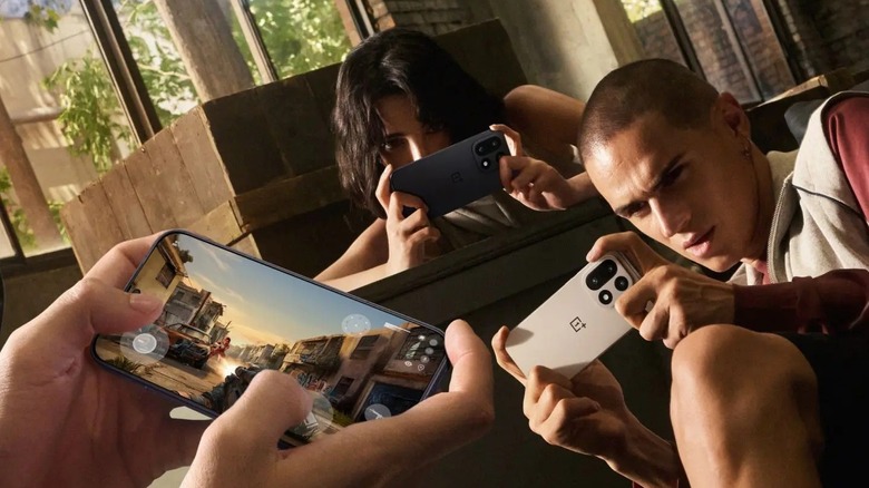 Promotional image of people gaming on a OnePlus 15