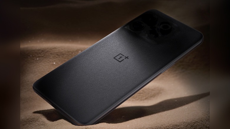 OnePlus phone on sand