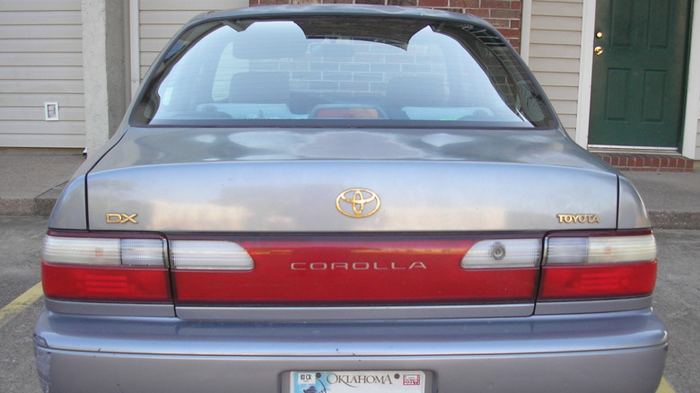 Rear view of silver 1997 Toyota Corolla DX sedan