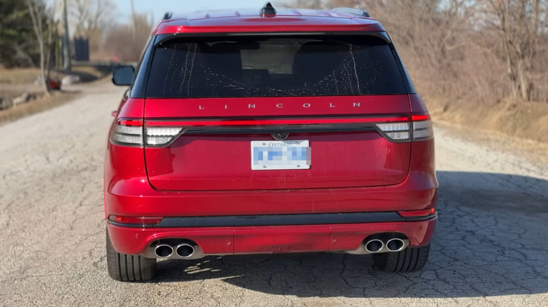 Rear view of red 2025 Lincoln Aviator SUV