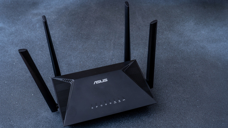 ASUS router against gray background
