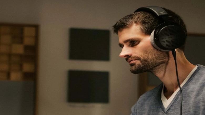 man wearing Beyerdynamic DT 900 Pro X