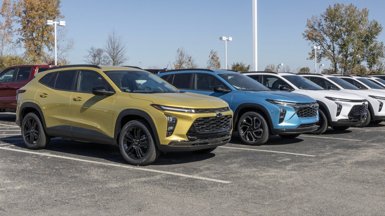A row of Chevrolet Trax models at a dealership.