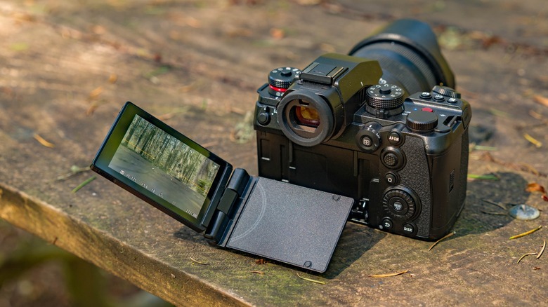Panasonic Lumix S1RII with the screen fully unfolded.