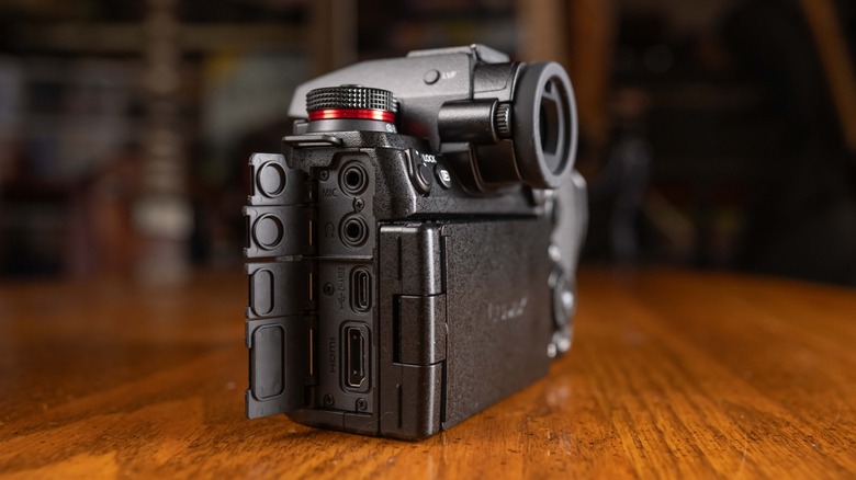 The Panasonic Lumix S1RII with its port covers open.