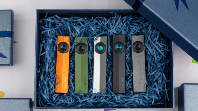 Various ArkPro devices in different colors in a gift box