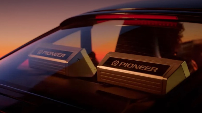 Rear deck of a car with pioneer speakers