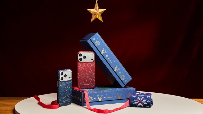 Contents of the PITAKA Christmas Gift Box displayed in the shape of a tree with a gold start at the top and red ribbon at the bottom