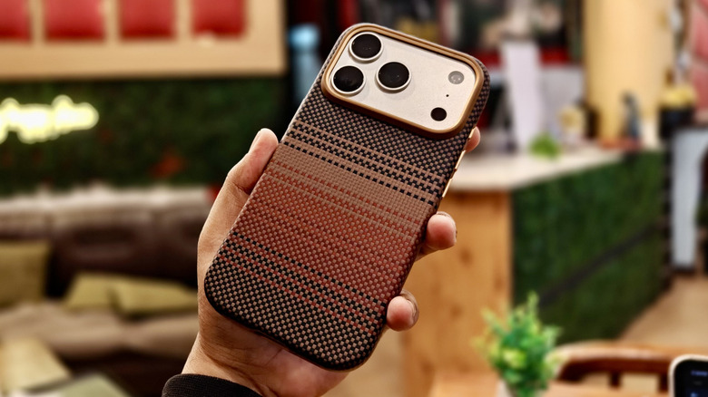 Pitaka Aramid UltraGuard case on an iPhone 17 Pro.