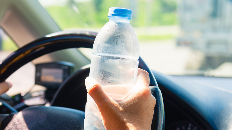 Plastic Water Bottles Left In The Sun Could Set Your Car On Fire – Here's How