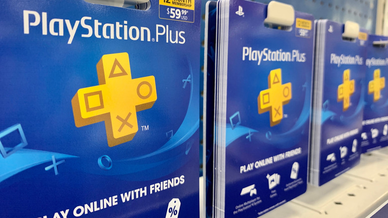 PlayStation Plus cards on shelf