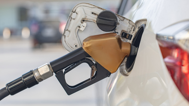 Car filling up at pump