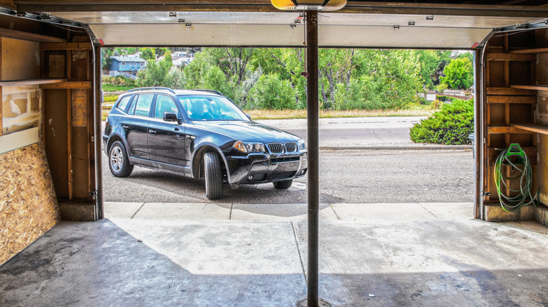SUV driving into garage