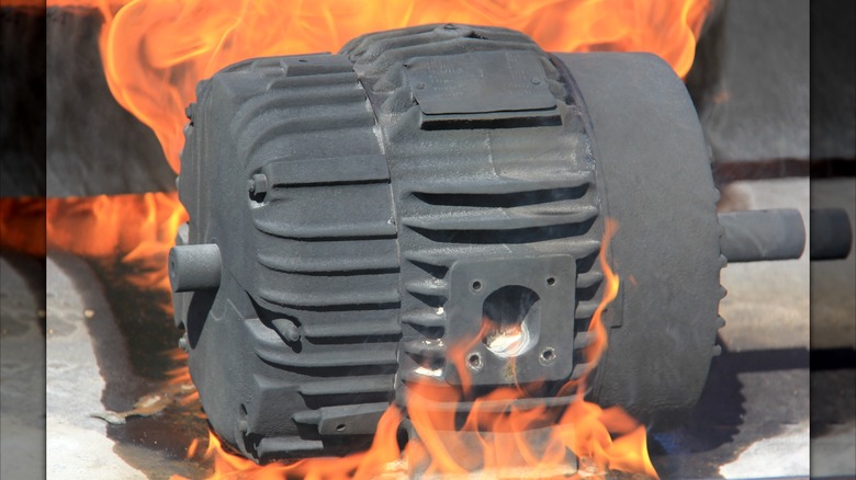 Image of an electric motor that overheated and is on fire