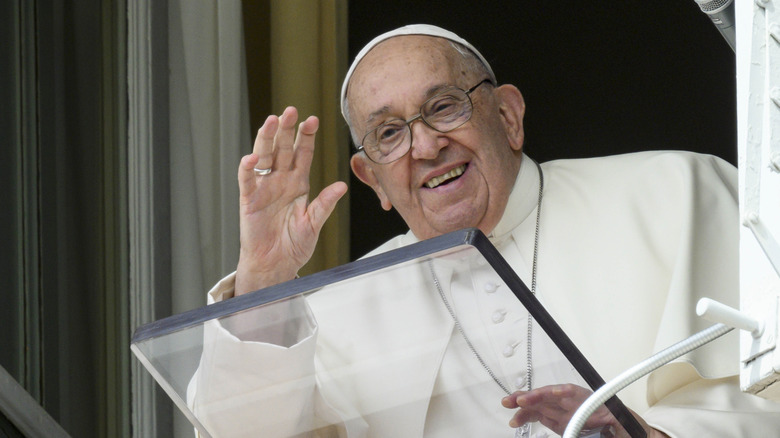 Pope Francis waving and addressing crowd